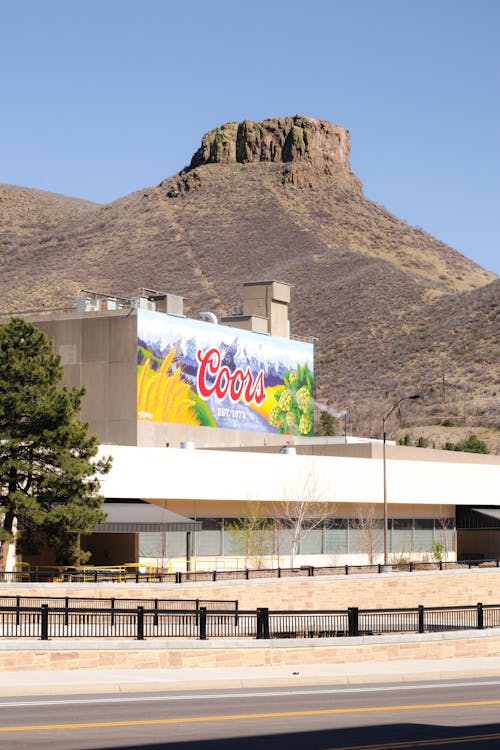 A large billboard with a mountain in the background