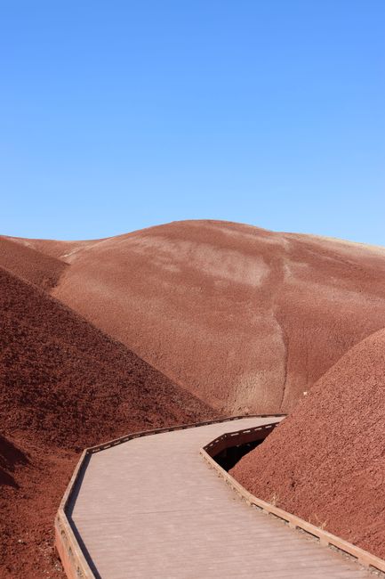 Explore the unique red landscapes of Painted Hills in Mitchell, Oregon, USA.