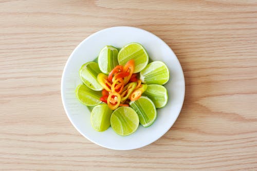 Green Fruit Slices on Plate