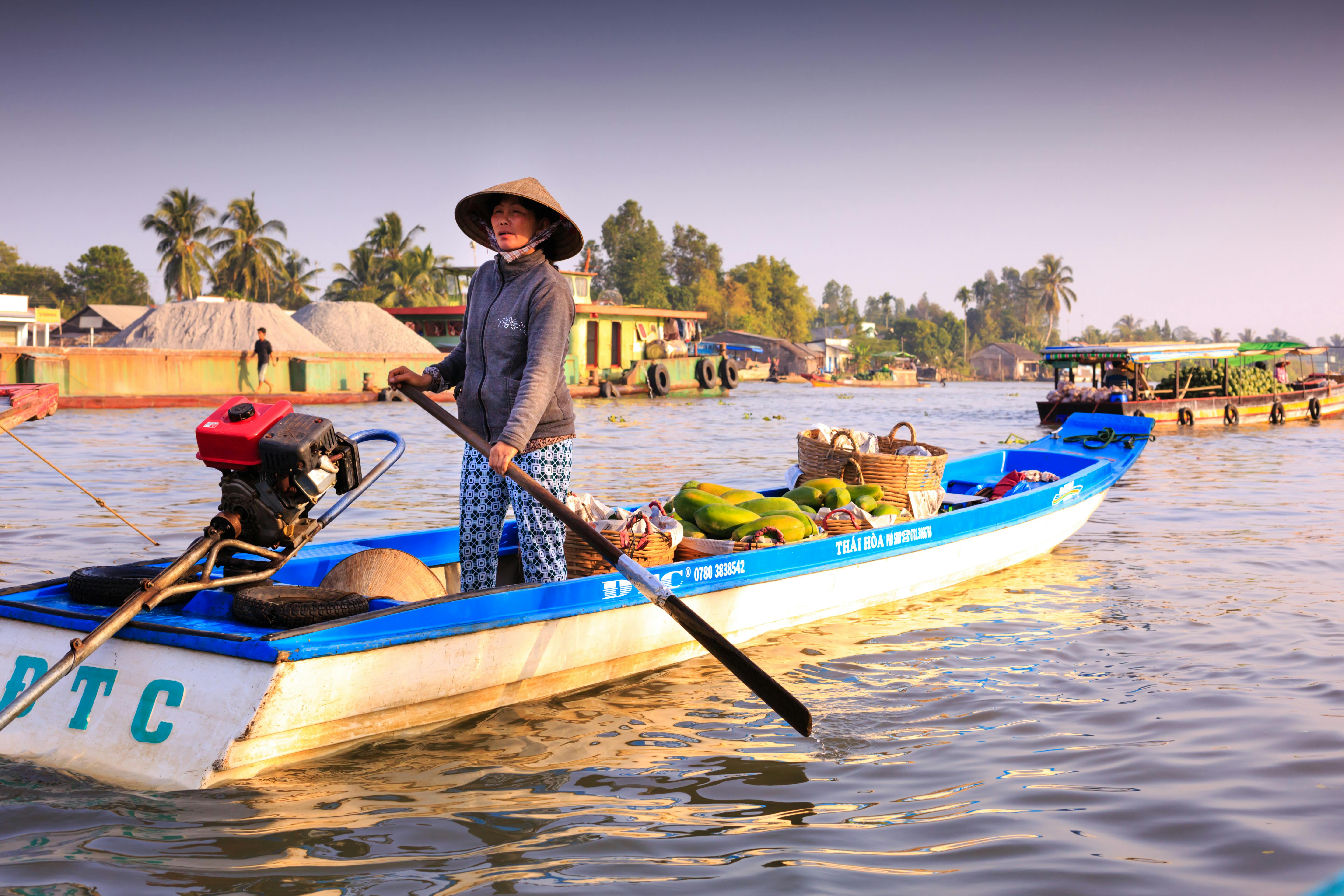 Woman Paddling on Boat · Free Stock Photo