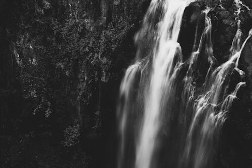 Black and white photograph of a waterfall