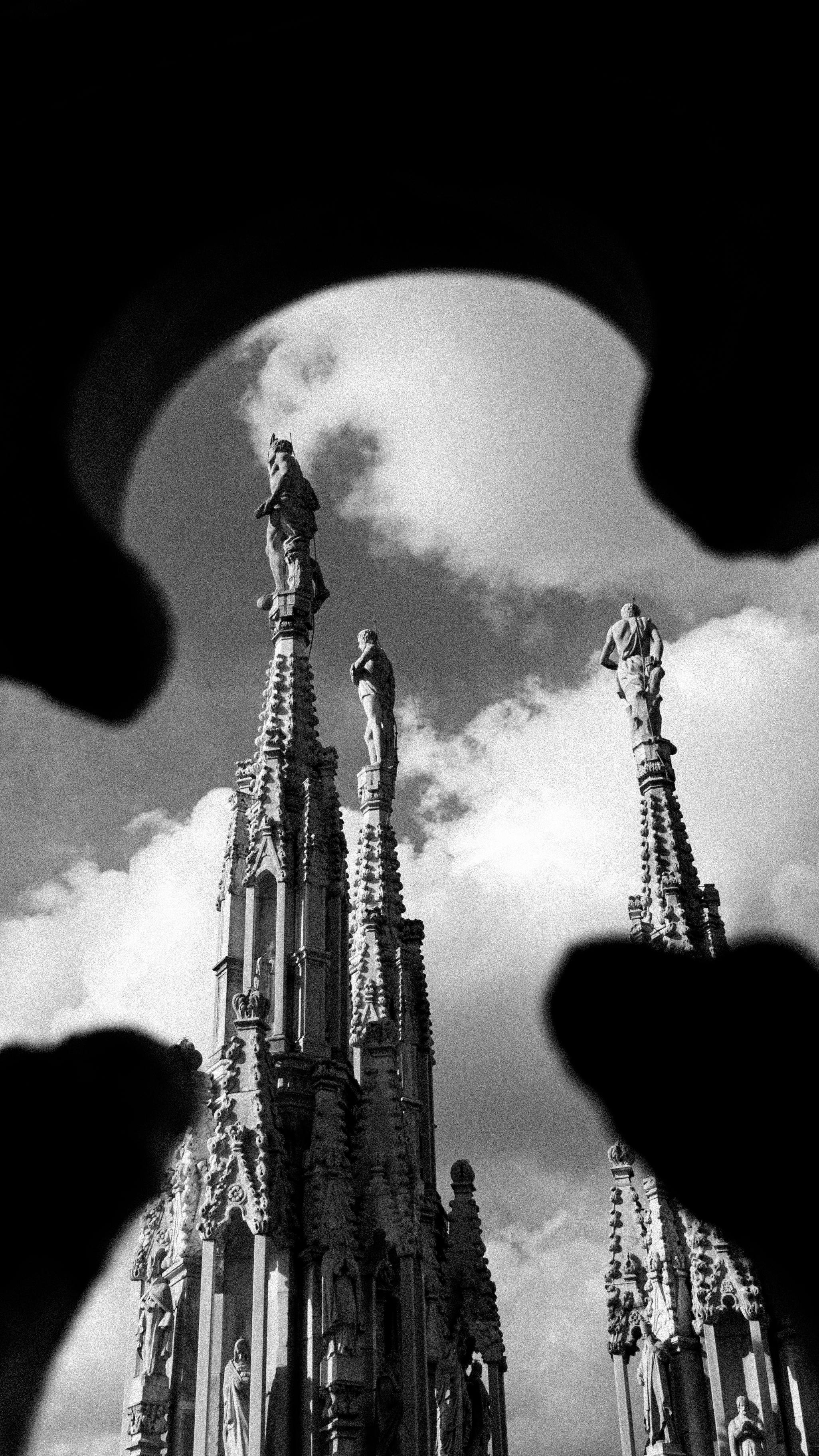 Intricate gothic spires of Milan Cathedral captured in timeless black and white.