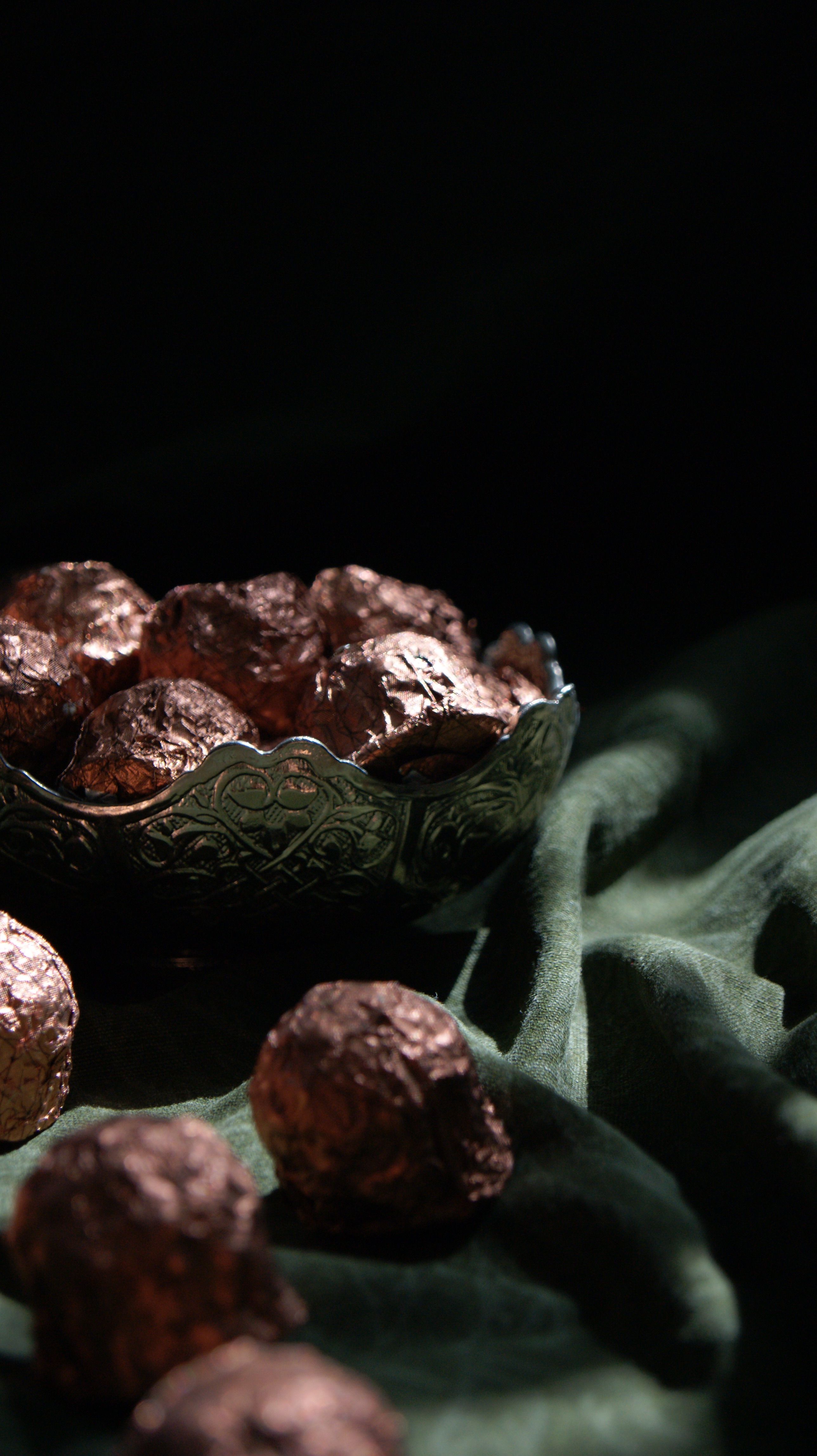 Delicious dark chocolate truffles in an elegant bowl, perfect for dessert and gifting.