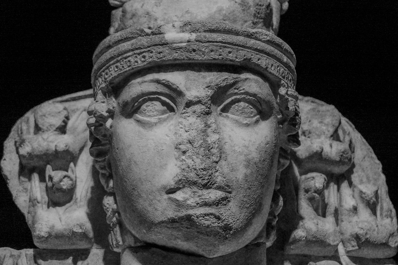 close up of an ancient greek goddess sculpture highlighting detailed c