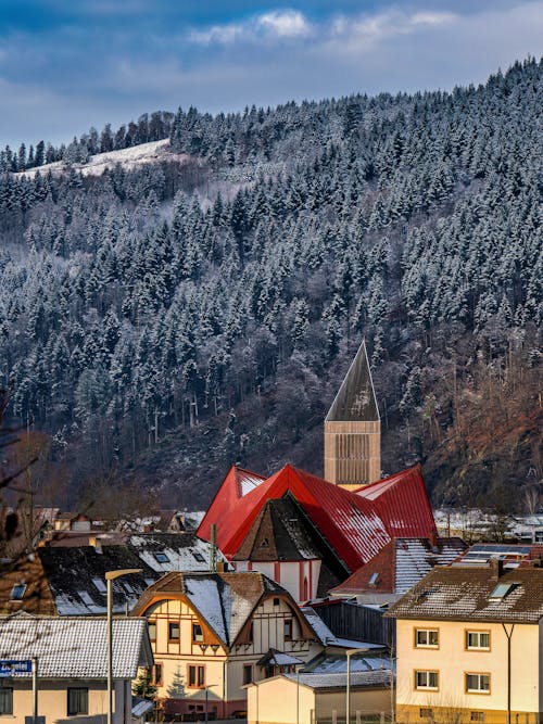 Free Church Among Coniferous Trees in a Mountain Valley  Stock Photo