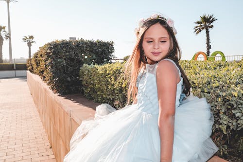 Photo Of A Girl Wearing White Dress