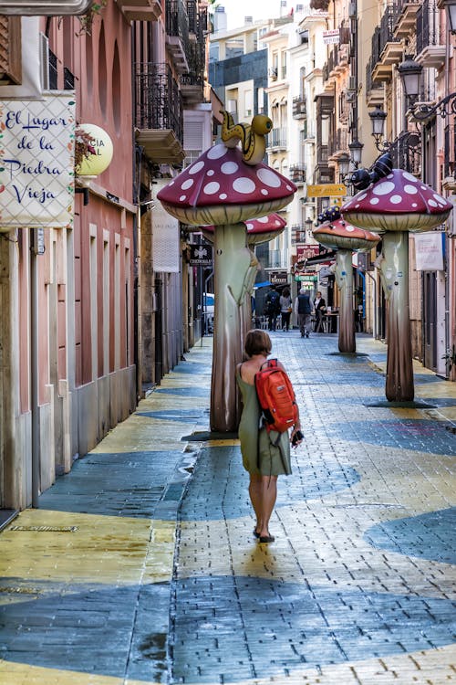 Woman Walking at Carrer de las Setas in Alicante in Spain