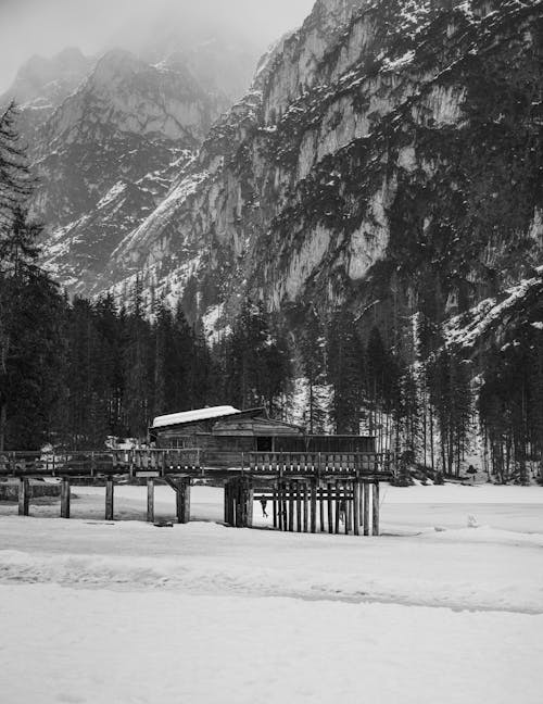 Free A black and white photo of a snowy mountain Stock Photo