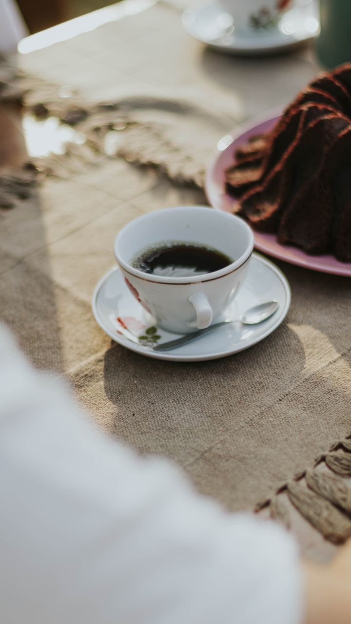 Natural burlap table runner laid across a counter for a dollar tree coffee bar design