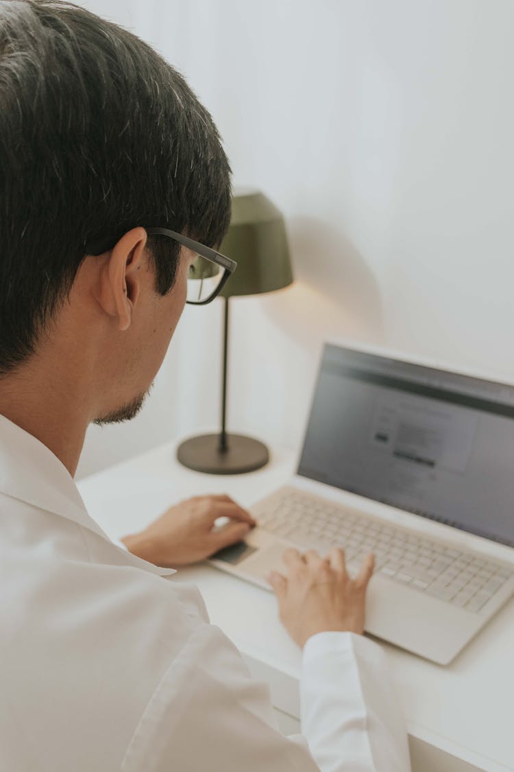 Man Working On Laptop