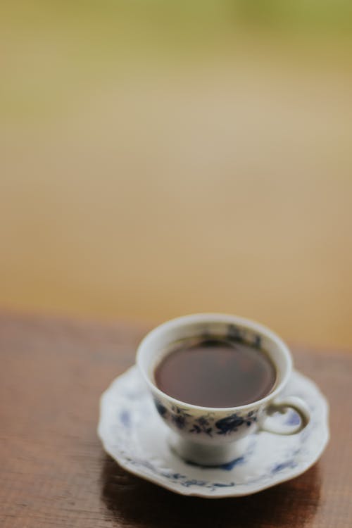 Free A cup of coffee on a table Stock Photo