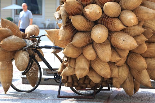 Bicycle Loaded With Brown Sacks