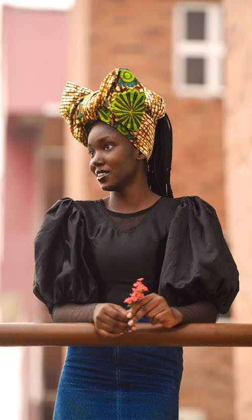 A woman with a large african headdress