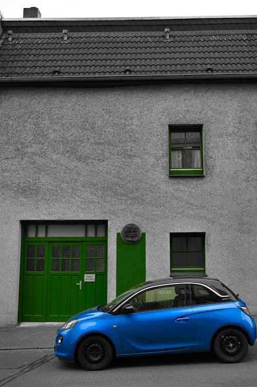 Free stock photo of blue car, buildings, car