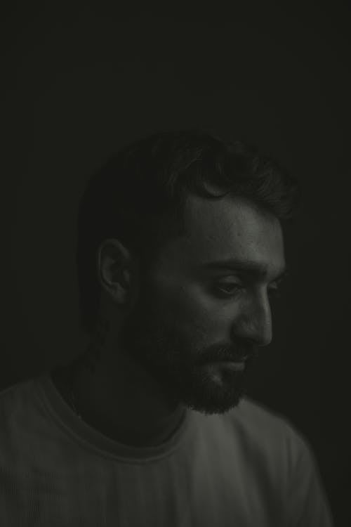 Free A man with a beard and a beard in black and white Stock Photo