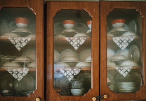Free A cabinet with many dishes and glasses on it Stock Photo