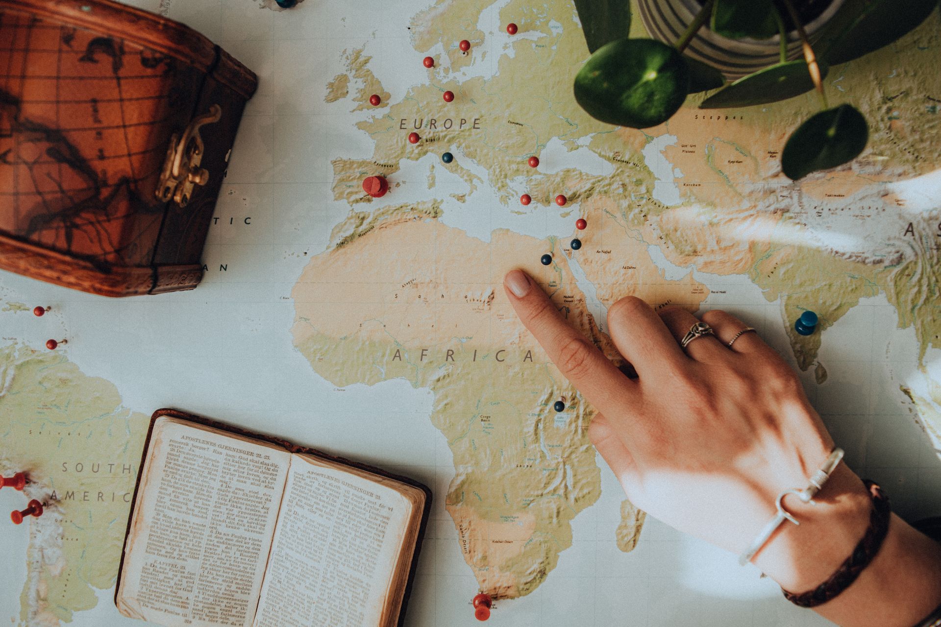 Woman Pointing at Map