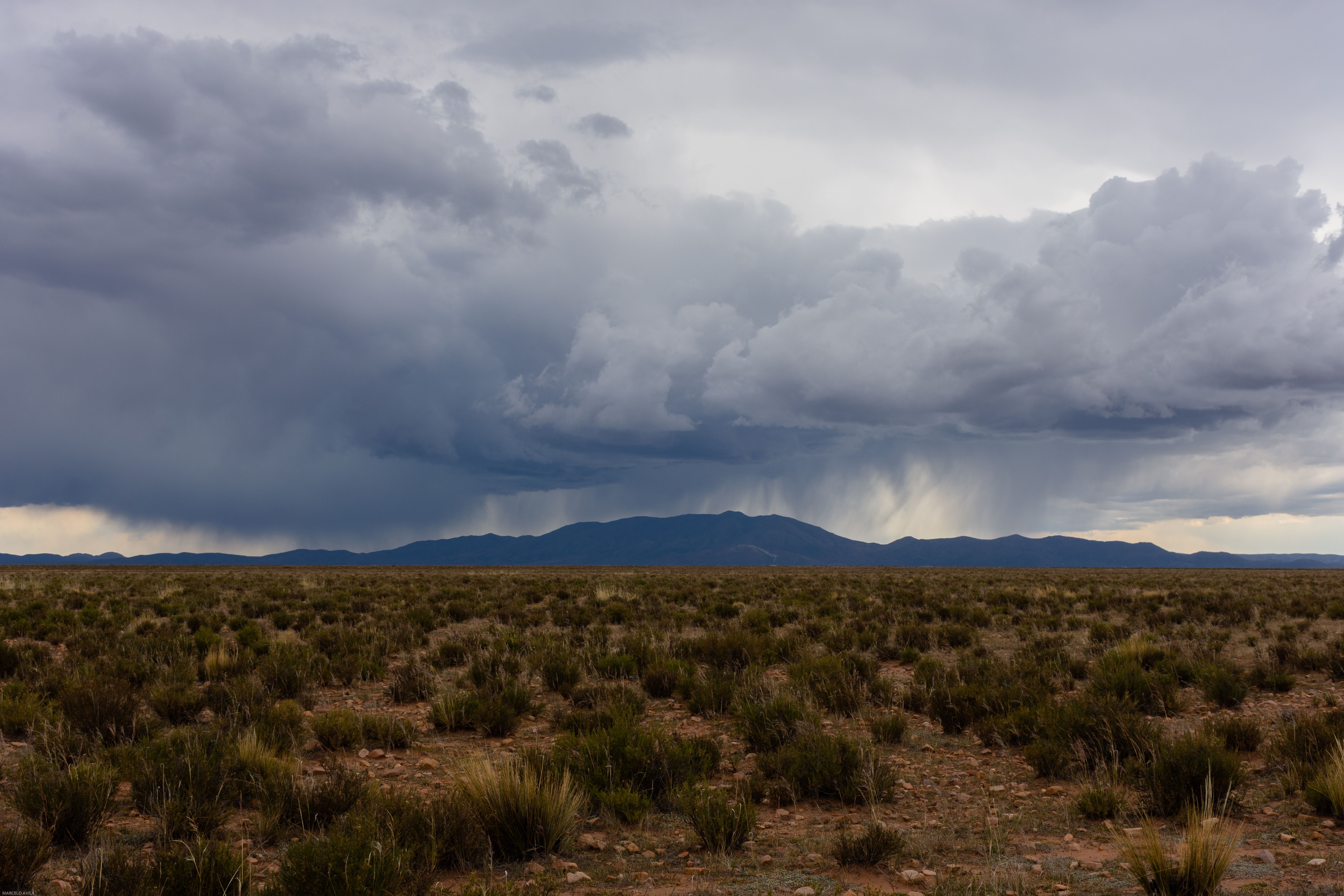 Capturing a stormy landscape in Yavi, Argentina with dramatic clouds over expansive plains.. pexels, capturing, stormy