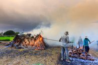 People Burning Clay Pots