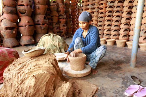 Woman Making Flower Pot