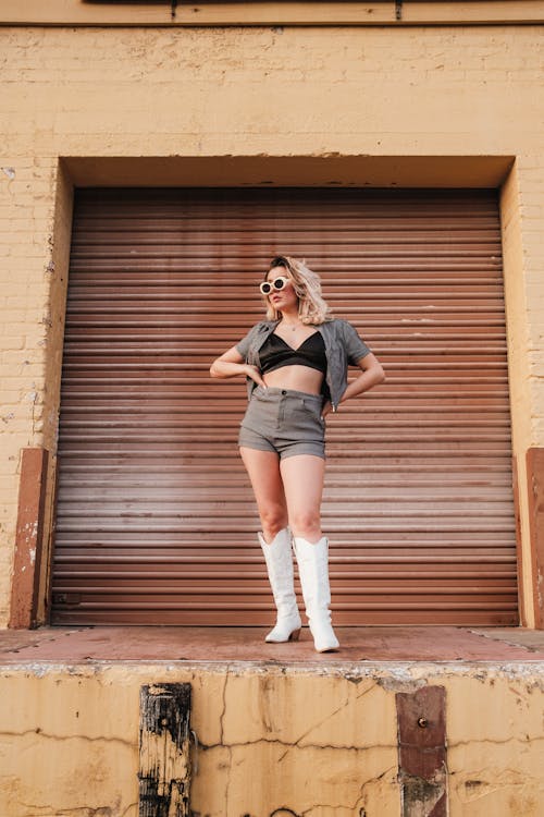 Blonde Woman Standing on Wall