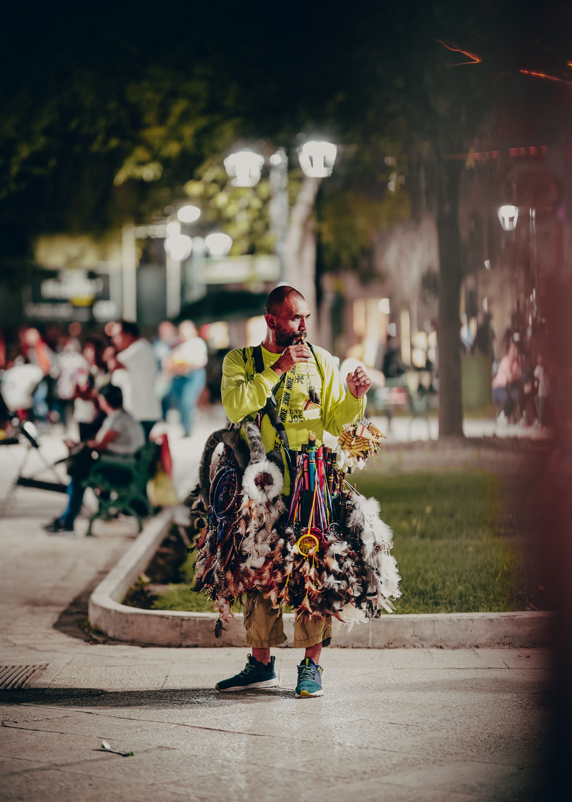 A Man in a Costume Standing on a Street in a City · Free Stock Photo