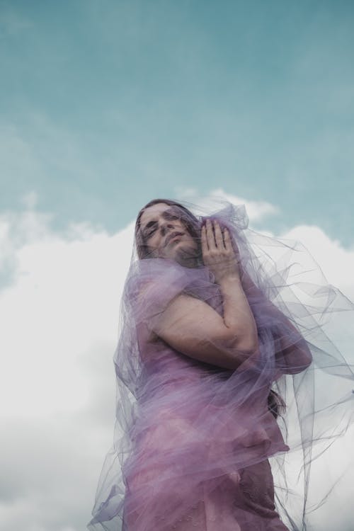 Portrait of Woman in Purple Veil