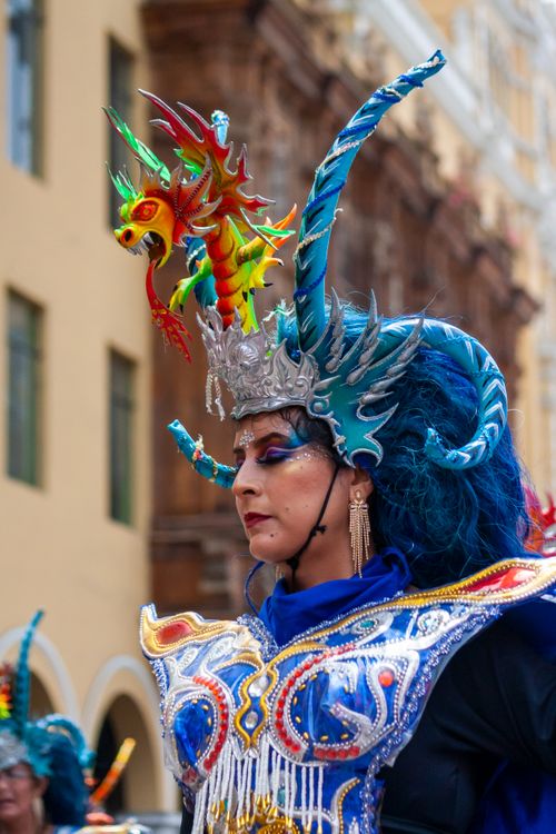 Free A vivid and intricate costume with dragon headdress at a festival in Lima, Peru. Stock Photo