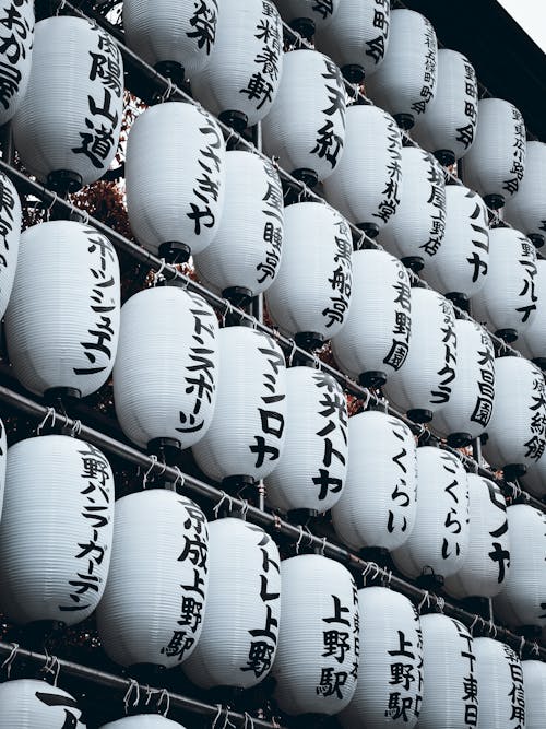 Free A large number of white lanterns with japanese writing on them Stock Photo