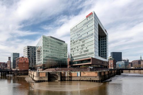 Free Contemporary office buildings along the canal in Hamburg's HafenCity. Stock Photo