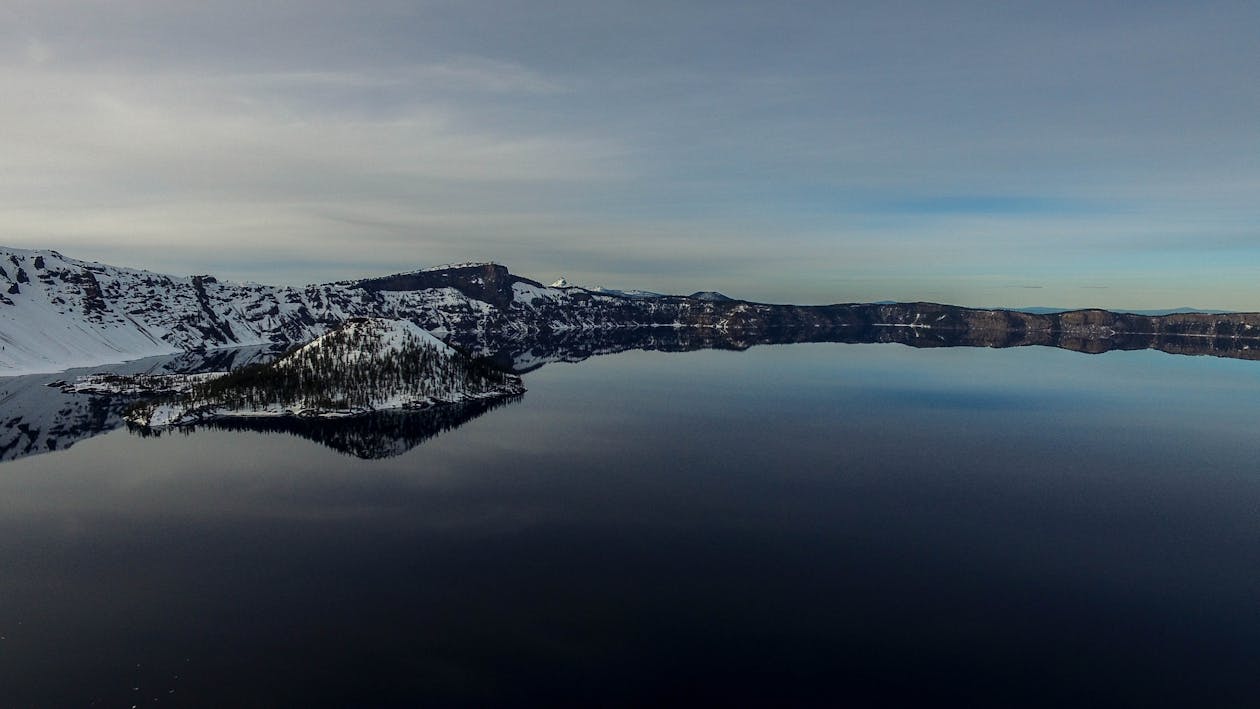 Cliff Near Calm Body of Water