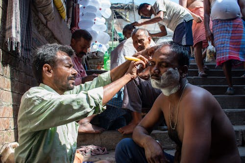 Street Barber at the Riverside