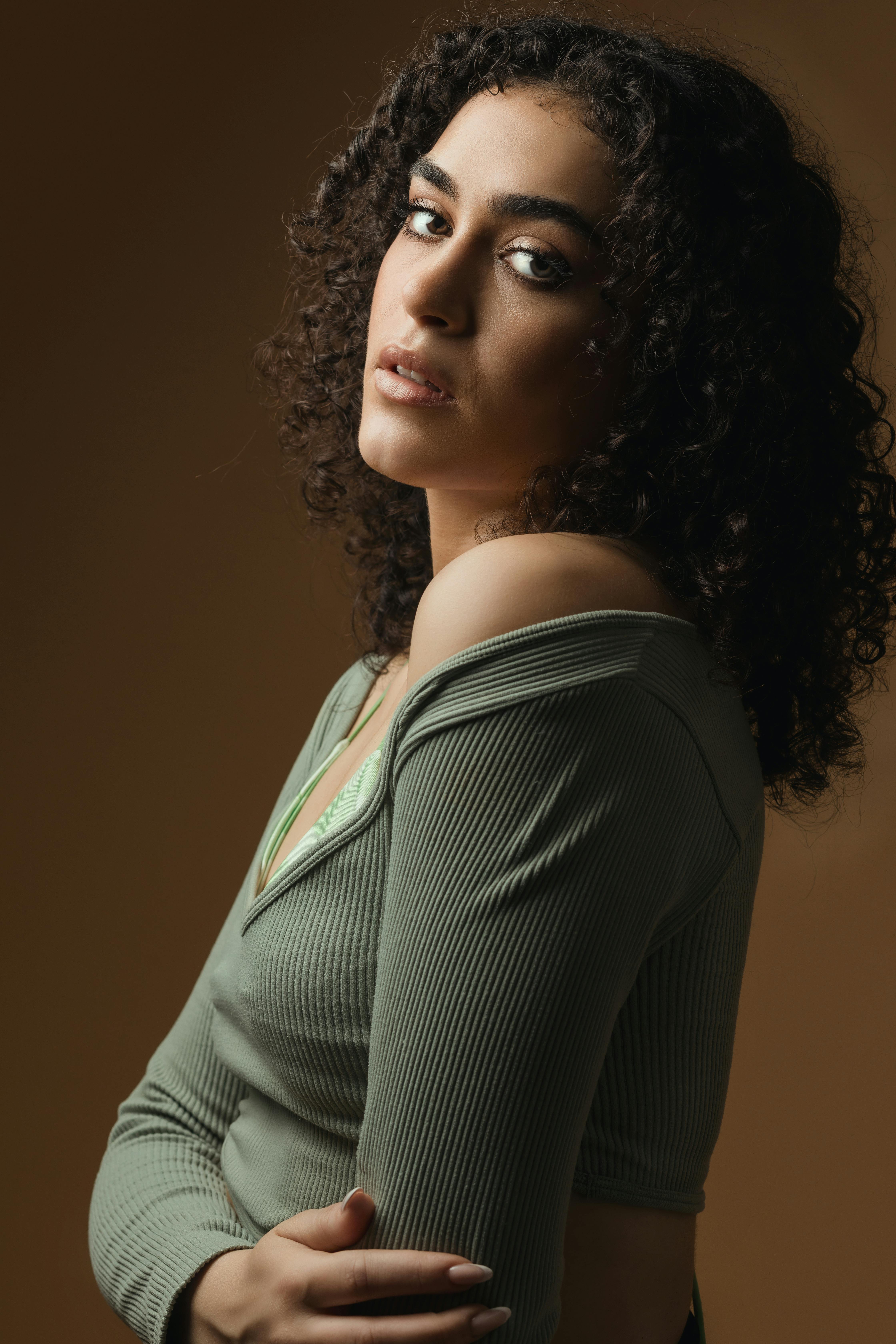 Brunette Woman with Curly Hair · Free Stock Photo