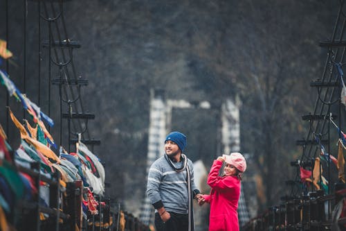 Man and Woman Standing Outdoor