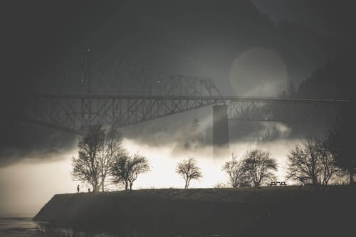 Grayscale Photography of Suspension Bridge