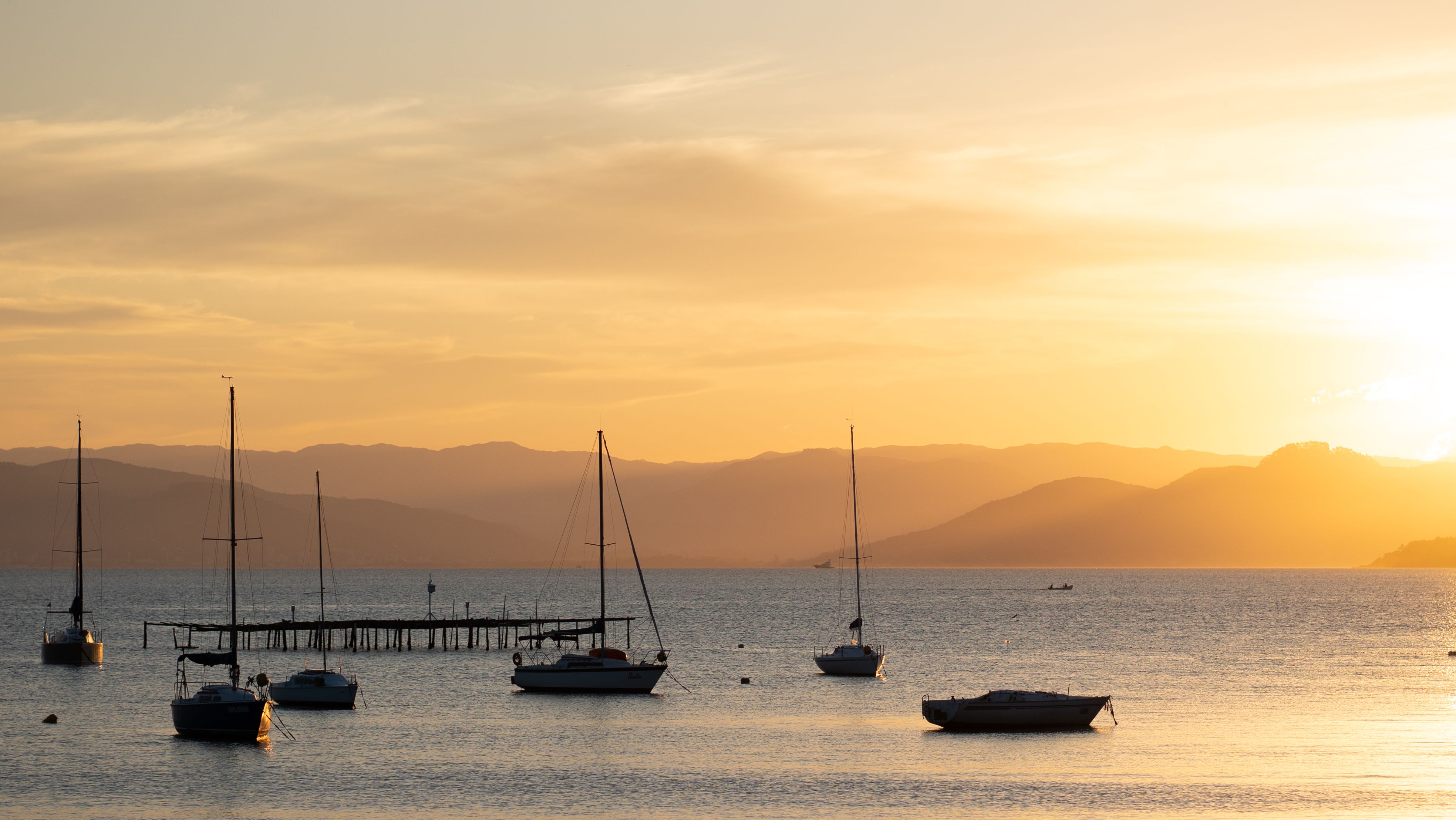 Sailing Boats in a Lake During Sunset · Free Stock Photo
