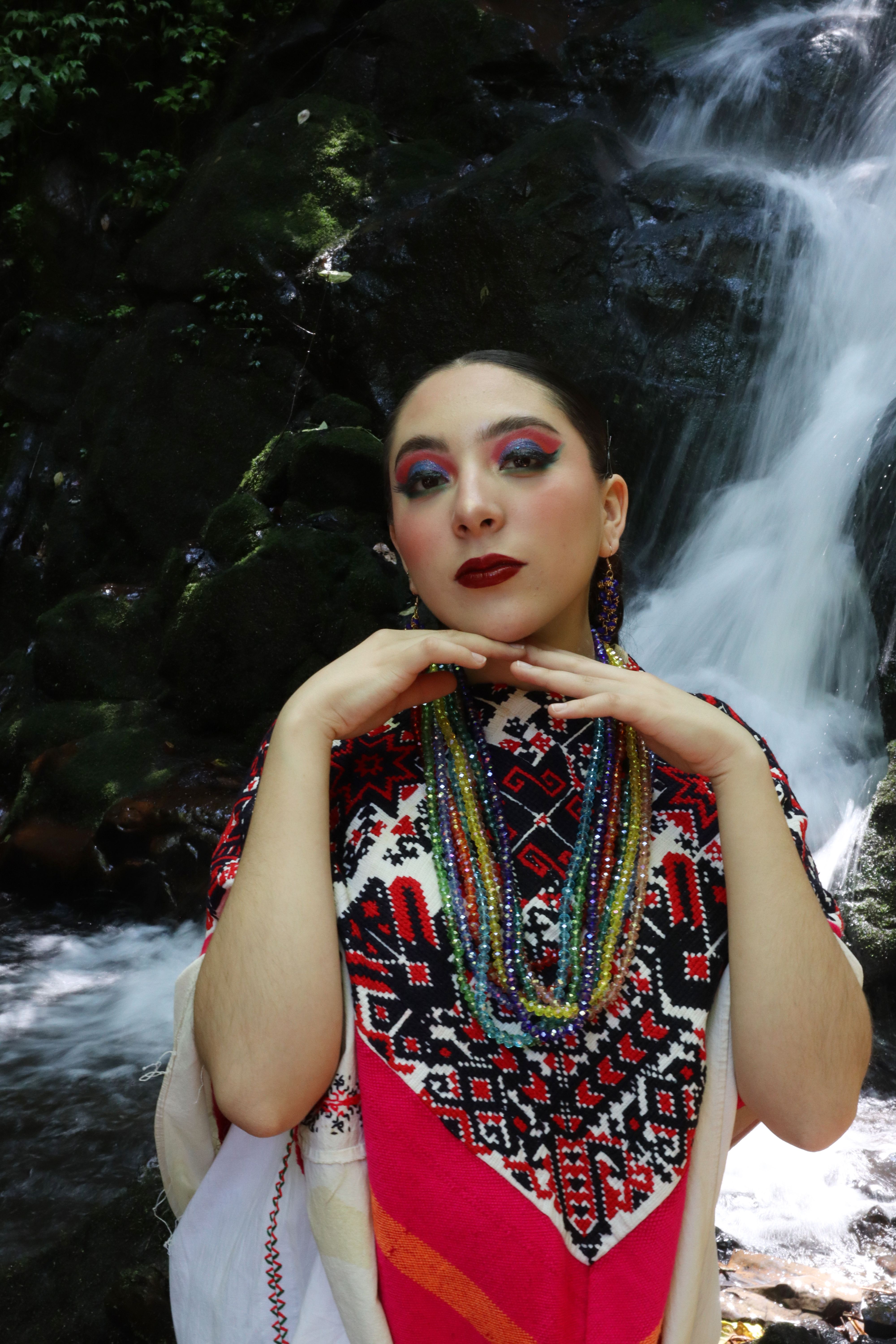 Portrait of a Woman Standing by a Waterfall · Free Stock Photo