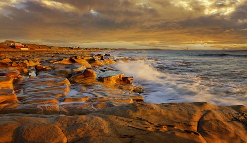 Waves Crashing into the Sea Shore