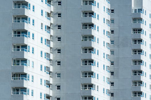 Detailed view of modern apartment balconies on a residential building in Rotterdam.