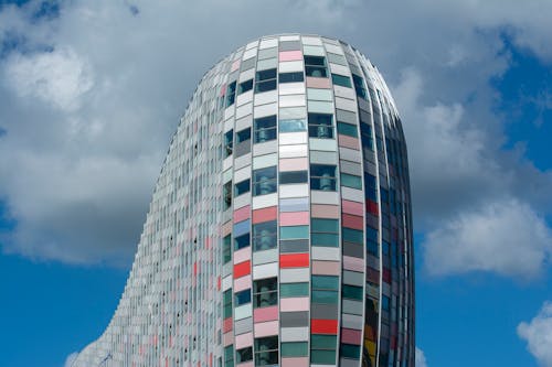 A building with a colorful facade against a blue sky