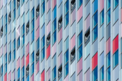 Free A close up of a building with many windows Stock Photo