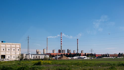 Foto d'estoc gratuïta de cel blau, contaminació de l'aire, fàbrica