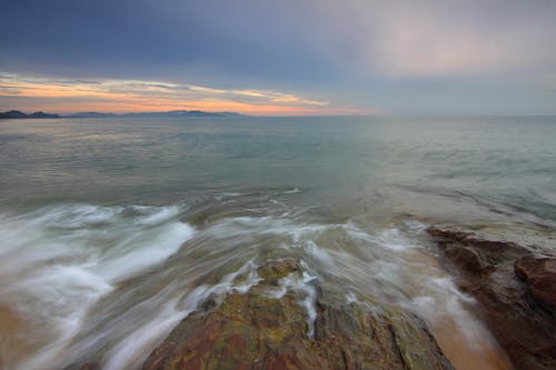 Panning Photography of Beach Shore