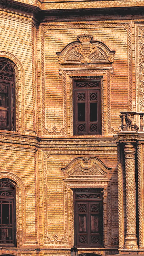 Foto profissional grátis de arquitetura, castanho, exterior do edifício
