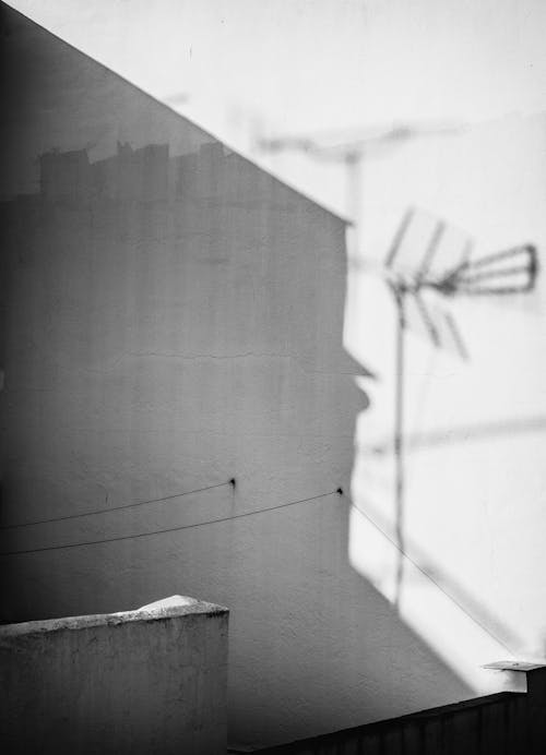 Free White wall with the shadow of another building on it Stock Photo