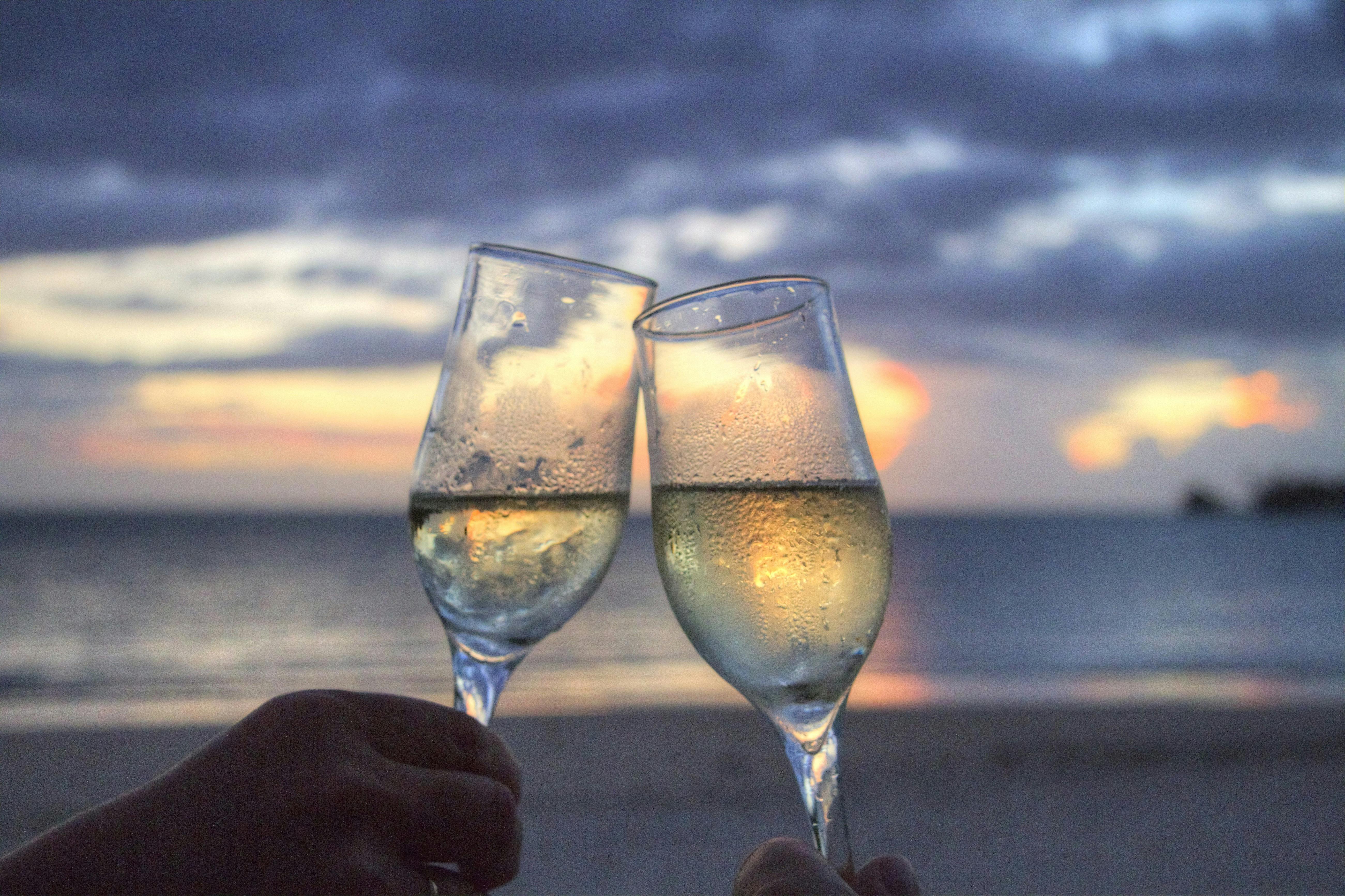 https://images.pexels.com/photos/2145/sea-sunset-beach-couple.jpg