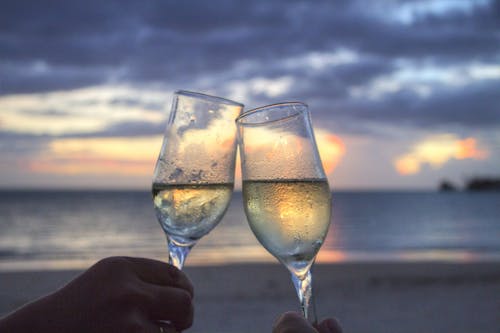 Free Two People Toasting Flute Glasses Stock Photo