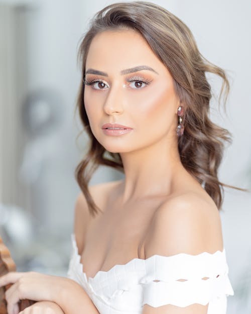 Selective Focus Photography of Woman White Tops