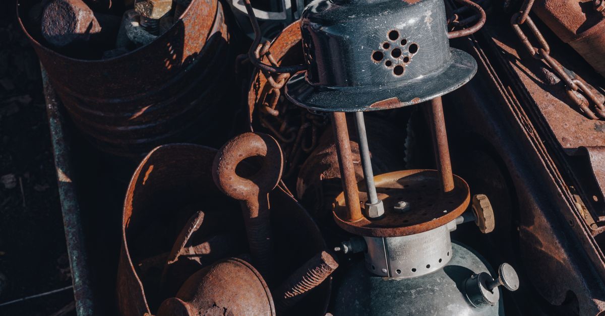 A pile of rusty objects on a table · Free Stock Photo