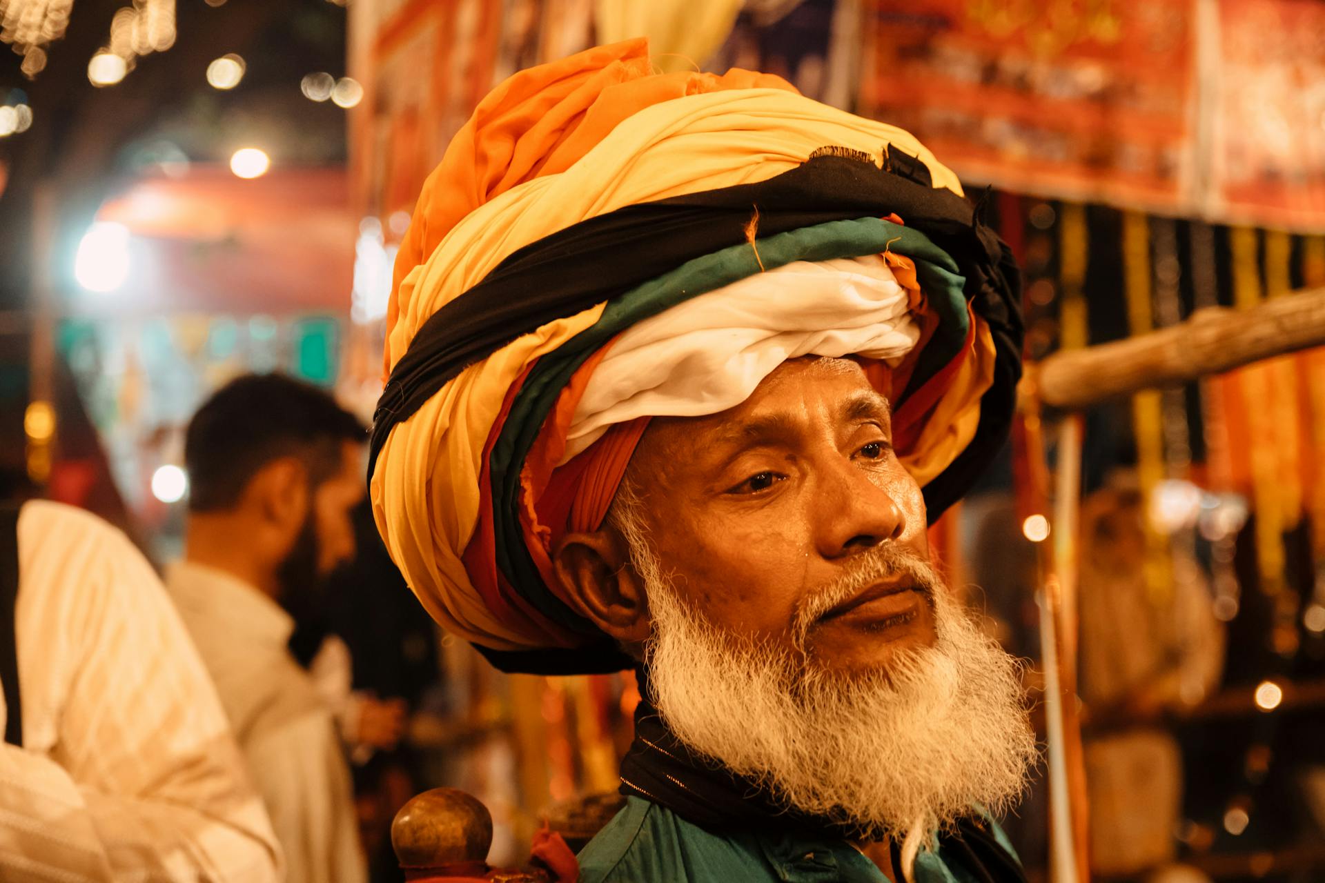 Man in an Orange, Yellow and Black Turban